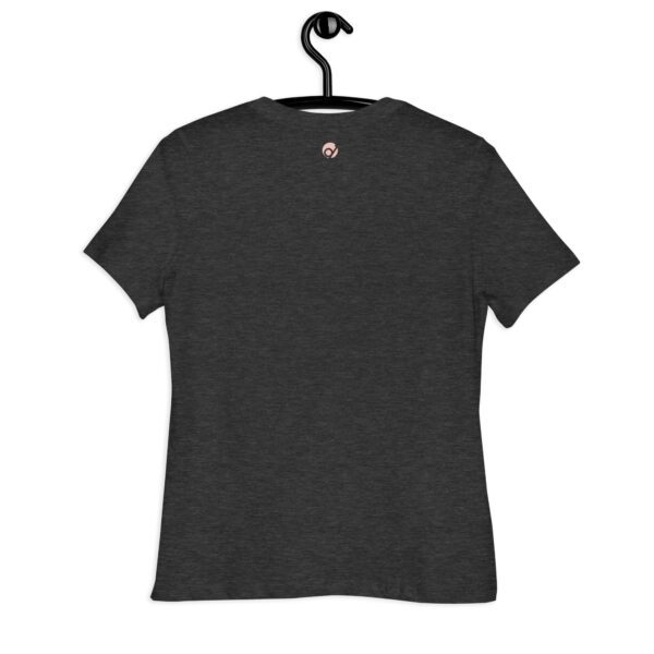 A black t-shirt hanging on the wall